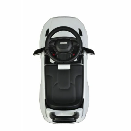White Range Rover Evoque ride on car foot to floor